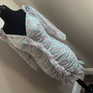 En Saison Ruched with sparkles of sequins.